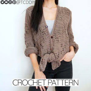 May include: A brown crochet cardigan with a V-neck and button closure. The cardigan is tied at the waist and has a textured stitch pattern. CROCHET PATTERN is written in white text at the bottom of the image.
