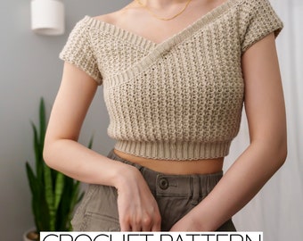 May include: A beige crochet top with a V-neck and short sleeves. The top has a criss-cross design in the front and is cropped at the waist. CROCHET PATTERN is written in black text at the bottom of the image.