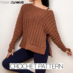 May include: A brown crochet sweater with an off-the-shoulder design and long sleeves. The sweater has a ribbed texture and a split hem. The text "CROCHET PATTERN" is displayed at the bottom of the image.
