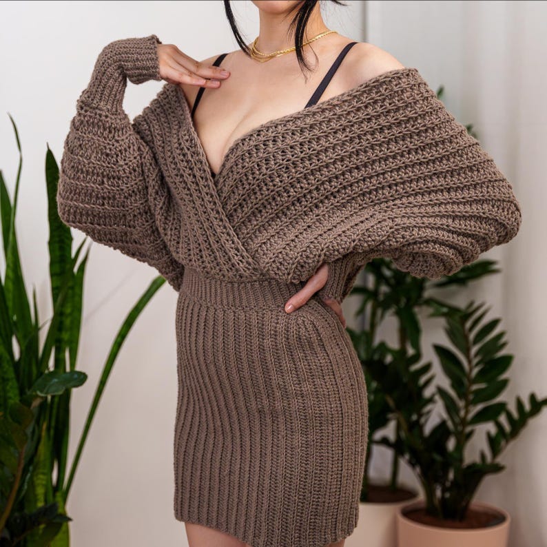TCDDIY crochet pattern for a batwing wrap sweater dress with ribbed cuffs and fitted skirt, crafted with Lion Brand Pound of Love in Taupe.