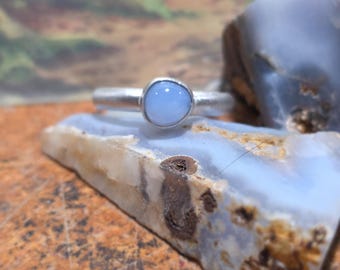 A classic and simple brushed finished Ellensburg blue and sterling silver ring!!