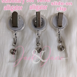 May include: Three clear plastic retractable badge holders with a silver alligator clip. The clips are stationary, 360 degree swivel, and slide-on.