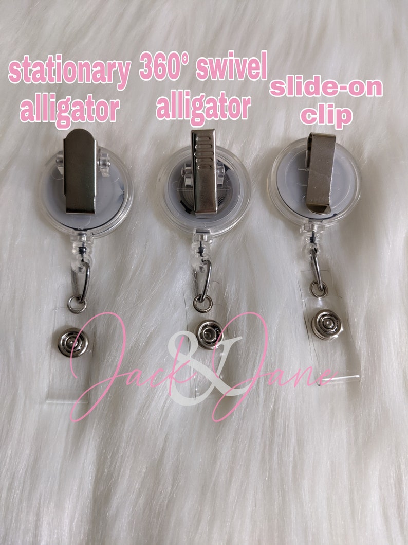 May include: Three clear plastic retractable badge holders with a silver alligator clip. The clips are stationary, 360 degree swivel, and slide-on.