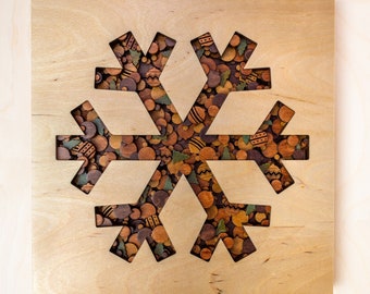 Cuadro decorativo de copos de nieve en capas de madera contrachapada de abedul, ensamblado a mano