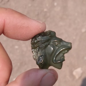 Moldavite lion carving