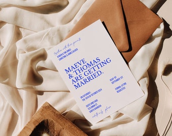 May include: A white wedding invitation with blue text. The invitation reads "Maeve & Thomas are getting married." The date is Saturday, October 10th, 2024 at Osito Vineyard, 123 Union St., Santa Barbara. The RSVP date is September 1st and formal attire is requested.