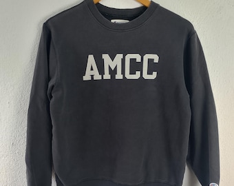 Sudadera Champion AMCC de cuello redondo, talla M.