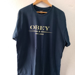 T-shirt Obey Homme Gris Graphique - Taille XL - 100% Coton (autre) - Occasion Bon état