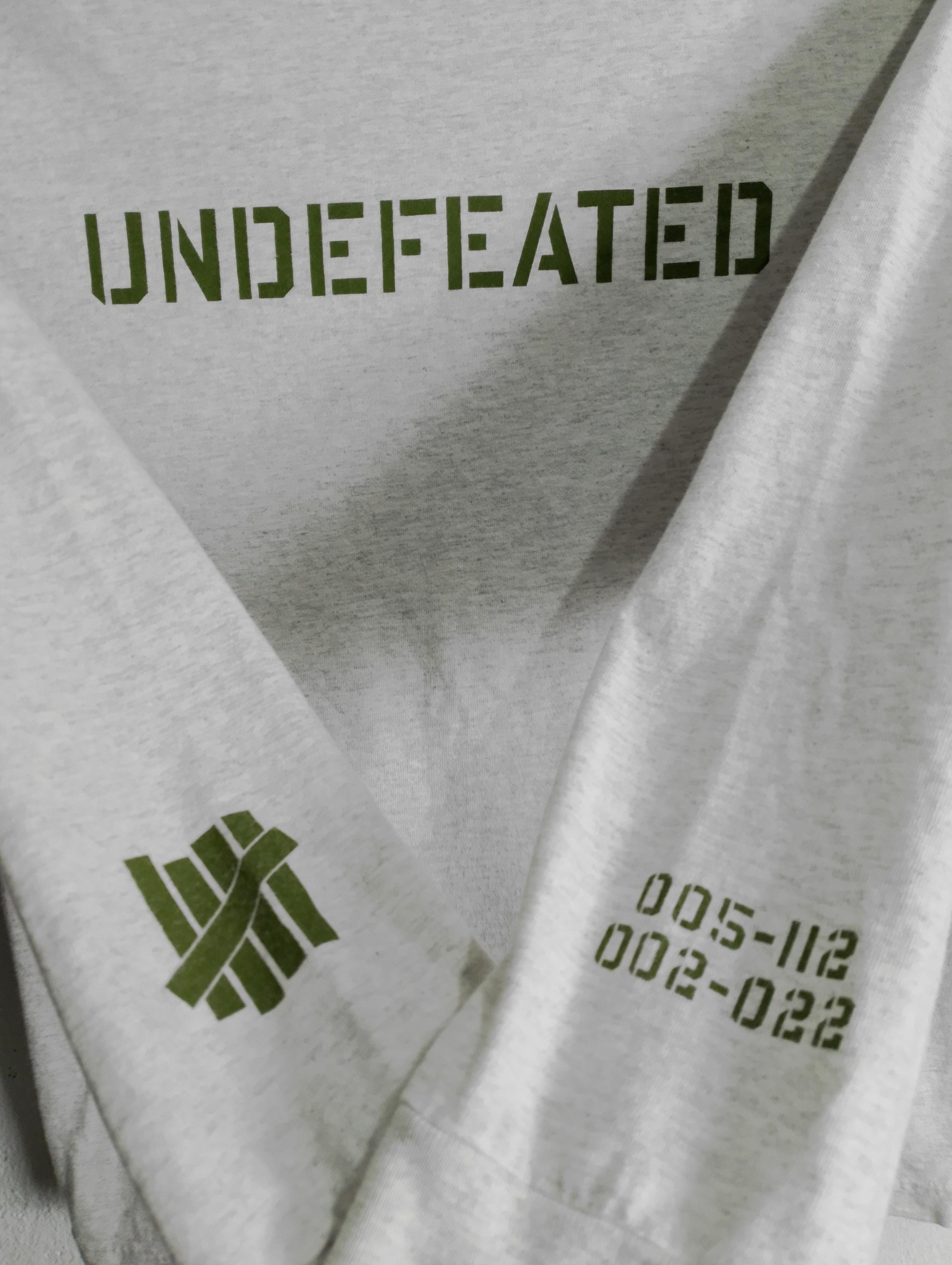 undefeated white tee