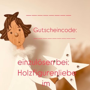 May include: A white wooden angel figurine holding a white star with rhinestones. The angel is wearing a white fur trim. The text on the image reads "Gutschein" "Über Betrag" "Gutscheincode" "einzulösen bei: Holzfigurenliebe im Etsy-Onlineshop".