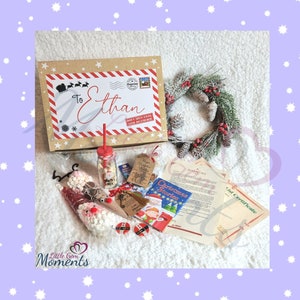 Personalisierte vorgefüllte Heiligabend-Box. Weihnachtsbox für Kinder gefüllt. Komplett individuell gestaltete Heiligabend Boxen mit Inhalt und Süßigkeiten.