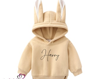 Sweat à capuche beige personnalisé avec oreilles de lapin de Pâques. Sweats à capuche Bunny Family pour enfants et adultes. Sweats à capuche assortis pour frères et sœurs. Tenue de Pâques avec nom pour la famille