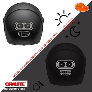 May include: Black motorcycle helmet with a reflective Bender design. The helmet features the text "ADESIVI CATARIFRANGENTI - STICKER REFLECTIVE" and "ORALITE REFLECTIVE FILM". The design includes day and night symbols.