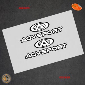 May include: Three white vinyl stickers with the logo "AGVSPORT" and a stylized letter "A" in a circle. The stickers are on a white background.