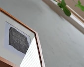 Poem WALD in picture frame typewriter on black tissue paper
