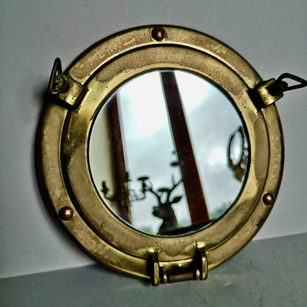 A 20cm Brass Porthole Vintage Mirror Nautical shape with screw fastening opening lid from Normandy France