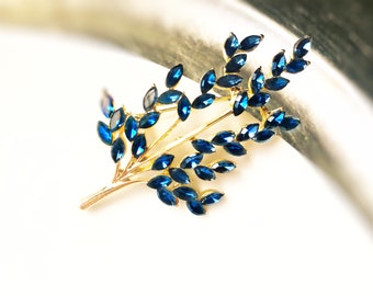 blue sapphire brooch