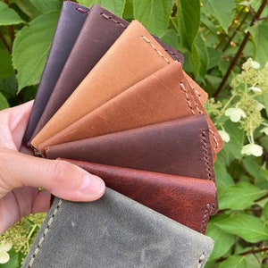 Brown, green and bordeaux color leather cardholder