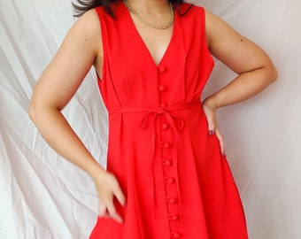 red dress with buttons down the front
