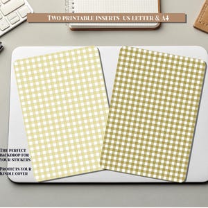 May include: Two printable inserts with a gingham pattern in olive green and light yellow, designed for US Letter and A4 sizes. The inserts are shown on a white surface, with text that reads "The perfect backdrop for your stickers" and "Protects your Kindle cover."