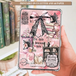 Könnte beinhalten: Eine rosa und schwarze dekorative Tablet-Hülle mit Schleife, Blumen und Text. Die Hülle zeigt die Sätze "Wenn mein Buch offen ist, sollte dein Mund geschlossen sein", "Ich lese lieber" und "Lesen ist Träumen mit offenen Augen."