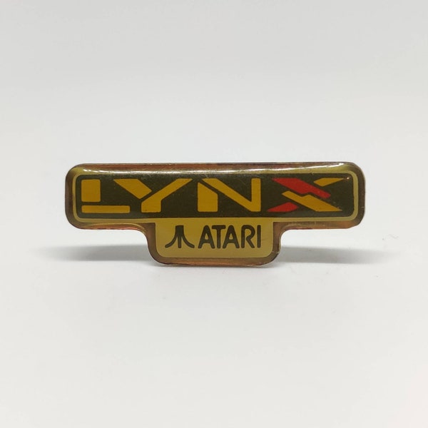 Lynx Atari insignia de alfiler vintage.