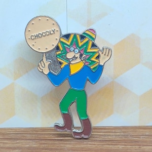 Chocoly advertising enamel lapel pin badge. Collectable Mexican denim leather jacket chocolate