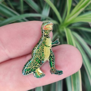 Vintage geëmailleerde reversspeld van Tyrannosaurus Rex dinosaurus.