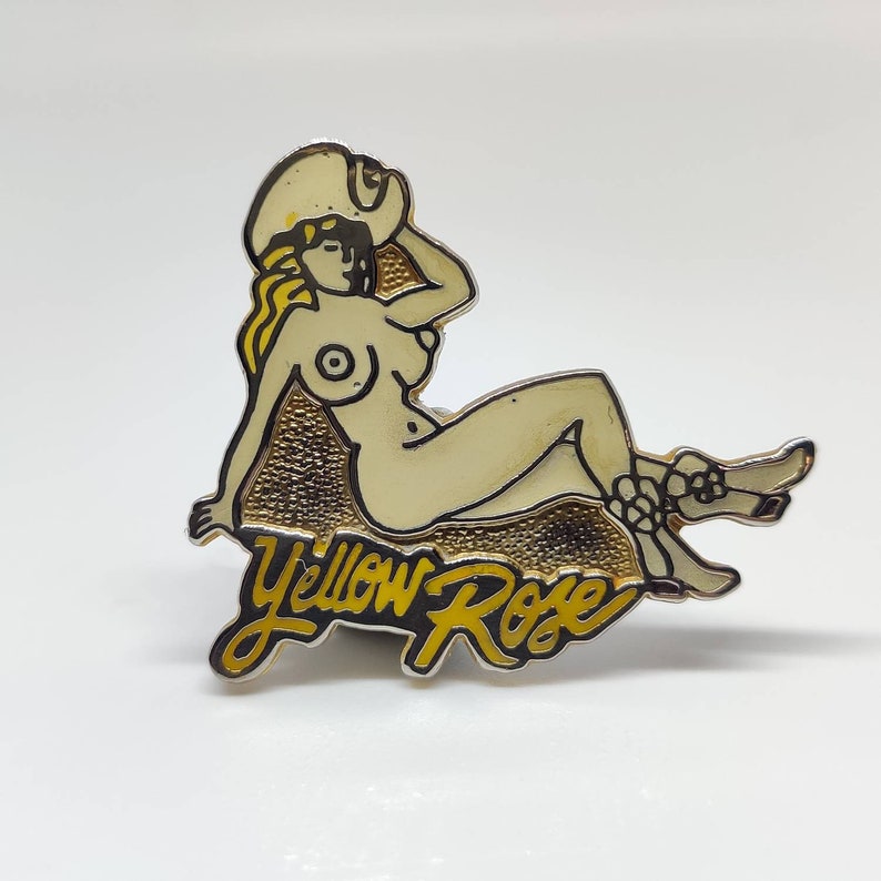 Yellow rose cow girl pin up nude Vintage enamel pin badge.