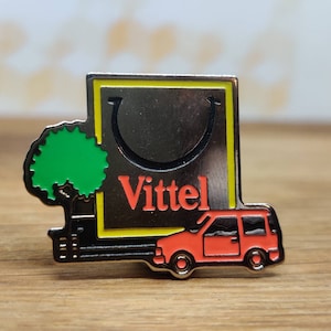 Vittel bottled water enamel pin badge. Vintage retro collectable advertising gift. Hat Tie Lapel scarf bag denim leather jacket accessorie