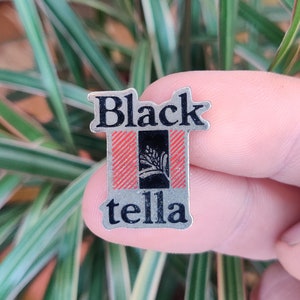 Blacktella vintage enamel lapel pin badge.