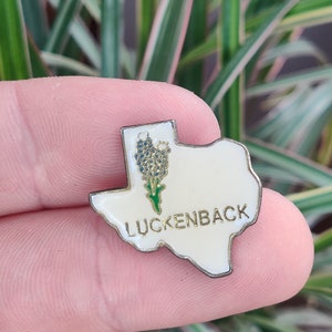 Luckenbach Texas vintage enamel lapel pin badge.