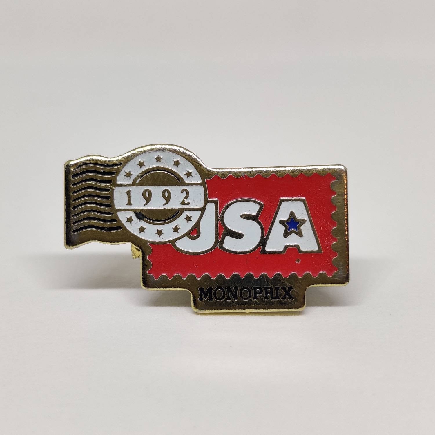 Badge vintage Monoprix USA 1992 émaillé France