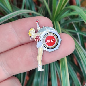 Lucky Strike Cigarettes Drummer Girl vintage enamel lapel pin badge.