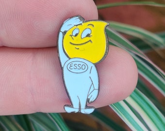 Esso oil drop man vintage enamel lapel pin badge.