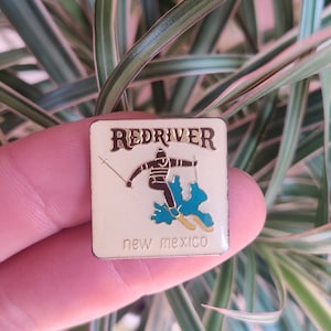 Red River New Mexico vintage lapel pin badge.