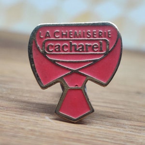 Cacharel chemiserie french fashion pin badge. Hat Tie Lapel bag scarf denim leather jacket. Vintage retro collectable advertising gift.
