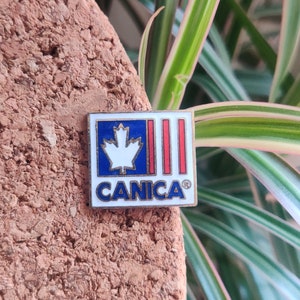 Canica Canadian flag vintage enamel lapel pin badge.
