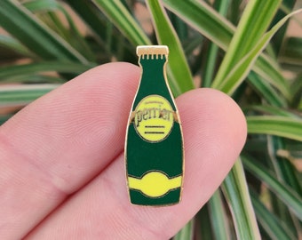 Perrier sparkling water vintage enamel lapel pin badge.