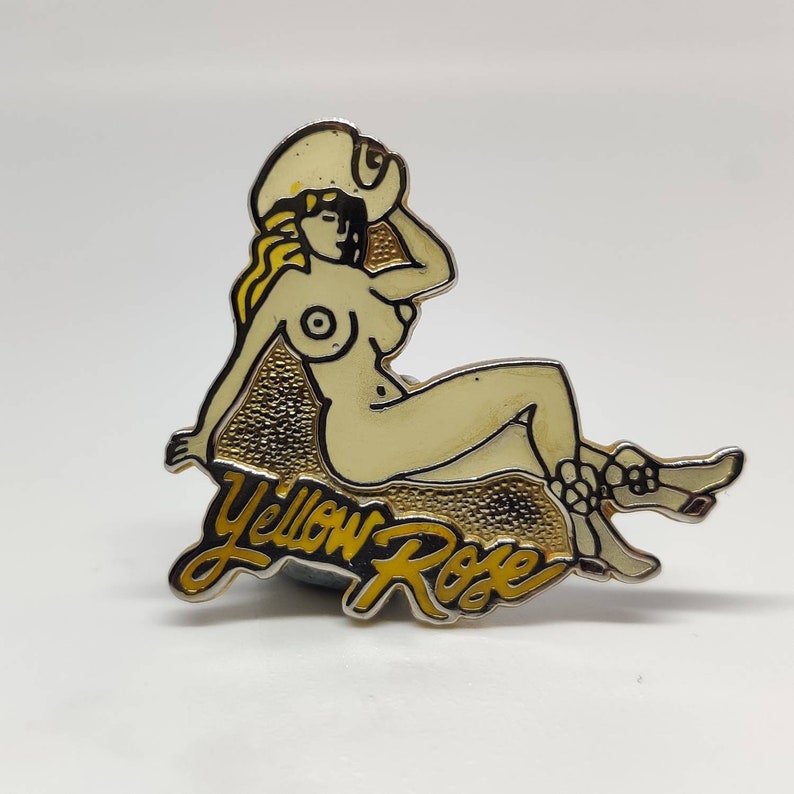 Yellow rose cow girl pin up nude Vintage enamel pin badge.