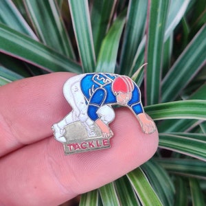 American football player vintage enamel pin badge.