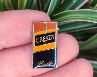 Crests Lindt chocolate enamel pin badge. Hat Tie Lapel scarf bag denim or leather jacket. Vintage retro collectable advertising gift.