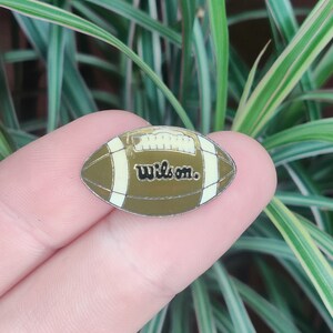 Wilson American football NFL vintage enamel lapel pin badge.