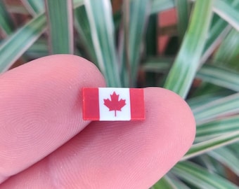 Canadian flag plastic vintage lapel pin badge.