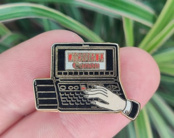 Canon Wordtank computer vintage enamel lapel pin badge.