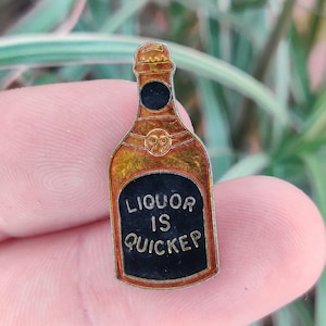 Liquor is Quicker vintage enamel lapel pin badge.