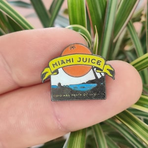 Miami juice vintage enamel pin badge.