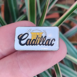 Cadillac vintage enamel lapel pin badge.