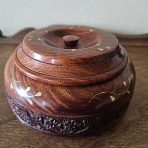 Ornate Carved Round Wooden Box with Brass Inlay