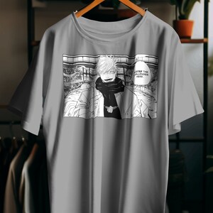 May include: Gray t-shirt with a black and white manga-style illustration of a character with spiky blonde hair and the text "You're the Challenger Here."